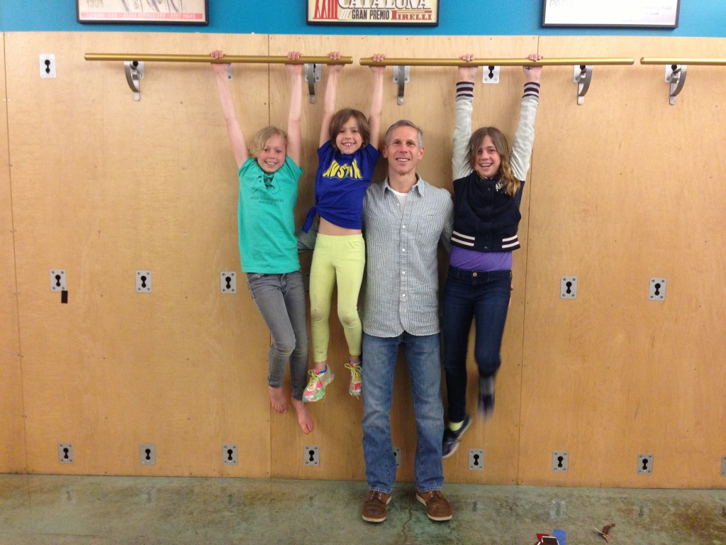 Member Spotlight & Interview! Meet Ben Gordon Ben Gordon with his kids hanging from Castle Hill ballet barres