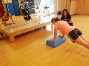 Amy working with personal trainer Tara Penawell