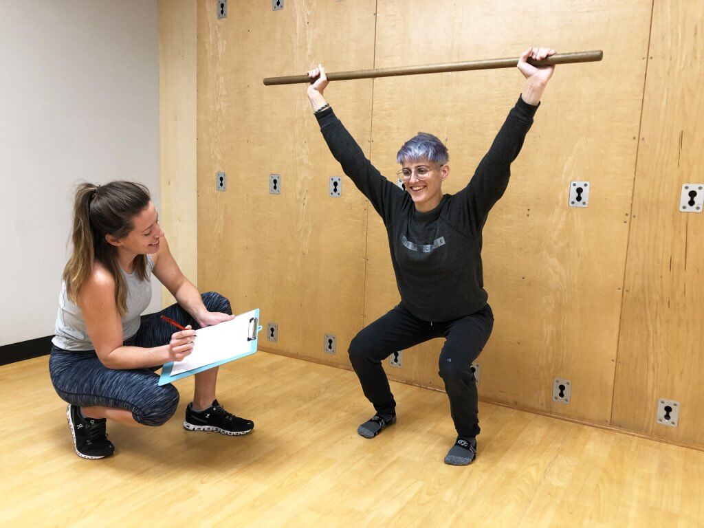 Person Receiving Initial Assessment Test from a Personal Trainer