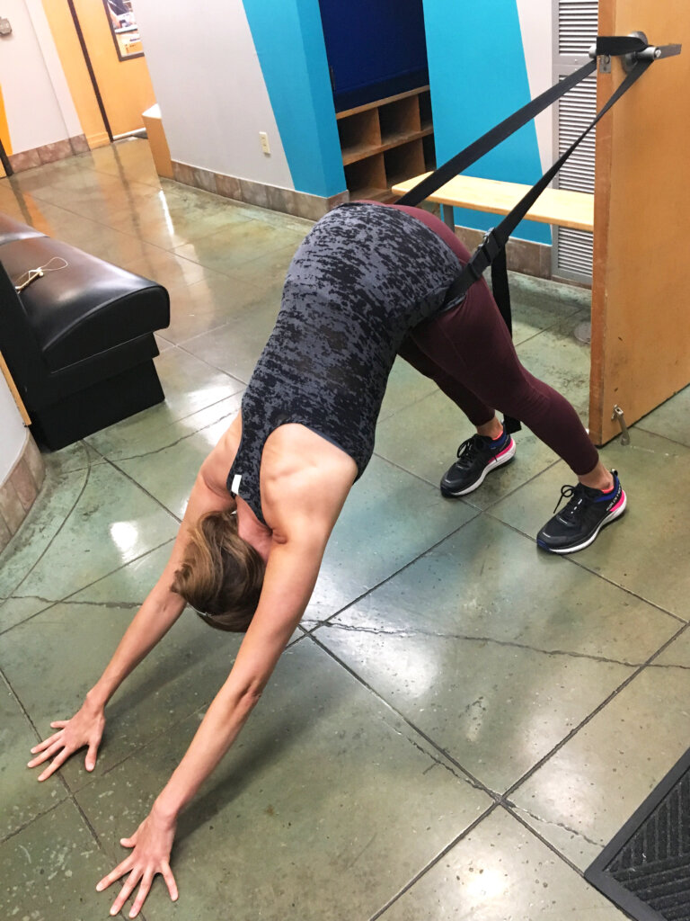 Anna Gieselman Downward Dog with a Yoga Strap on the Door