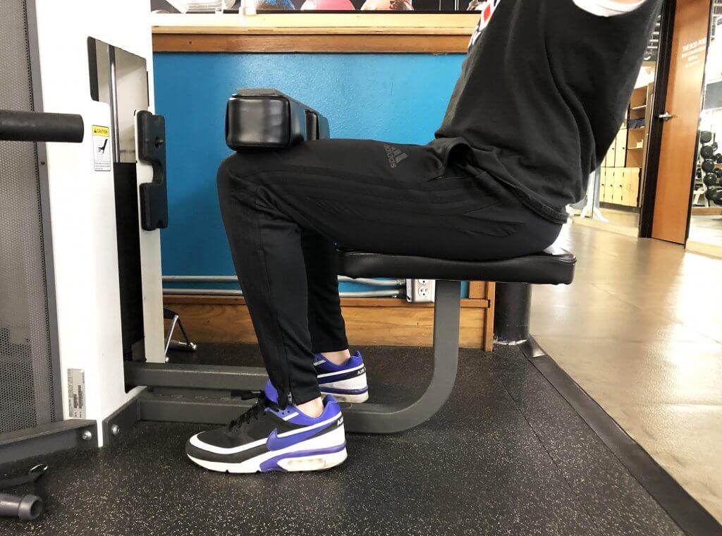 Lat Pull Down Exercise with Keith Kohanek - Thigh Guard Resting Properly Against Thighs