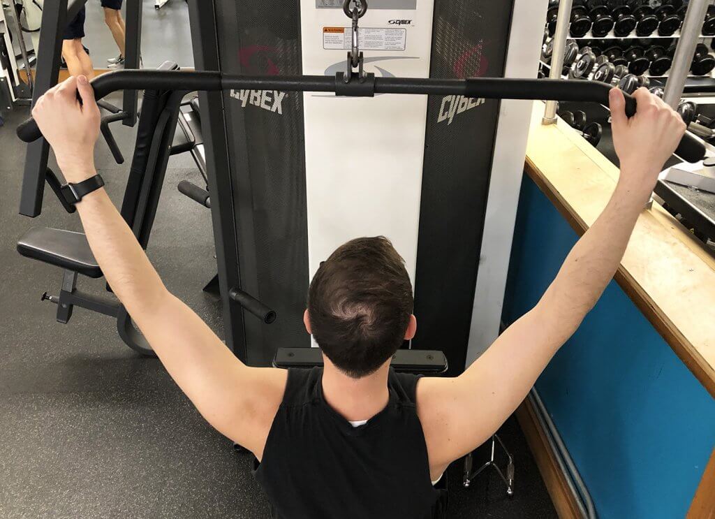 Second Step of Lat Pull Down Exercise with Keith Kohanek - Wide Grip on Bars, Slightly Wider Than Shoulders