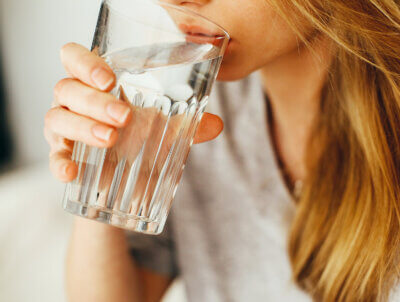 Woman Drinking Water to Boost Immune System