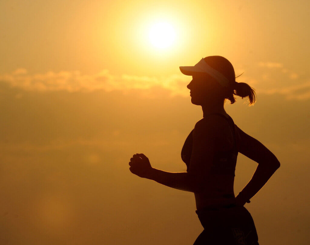 Woman Exercising to Improve Immune System