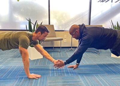 Jeremy Sims and Danny Brooks Planksgiving Partner High Fives