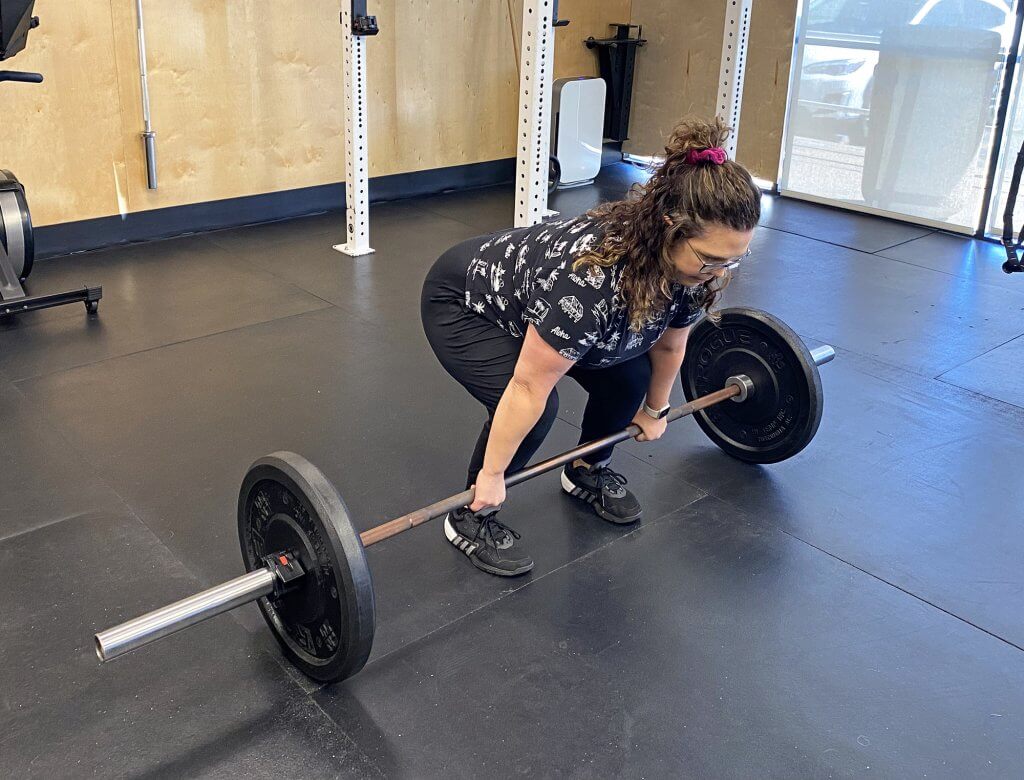 Tara Penawell Lifting a Heavy Barbell